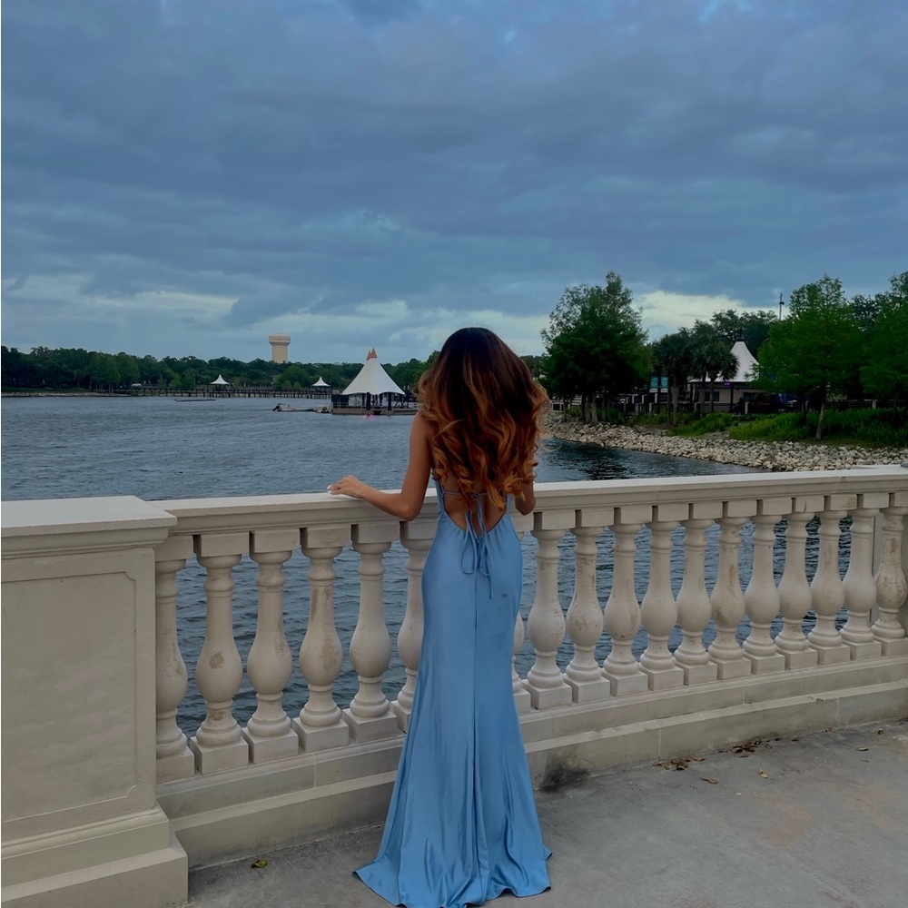 Selling beautiful baby blue tie back prom dress with a slit, size extra small